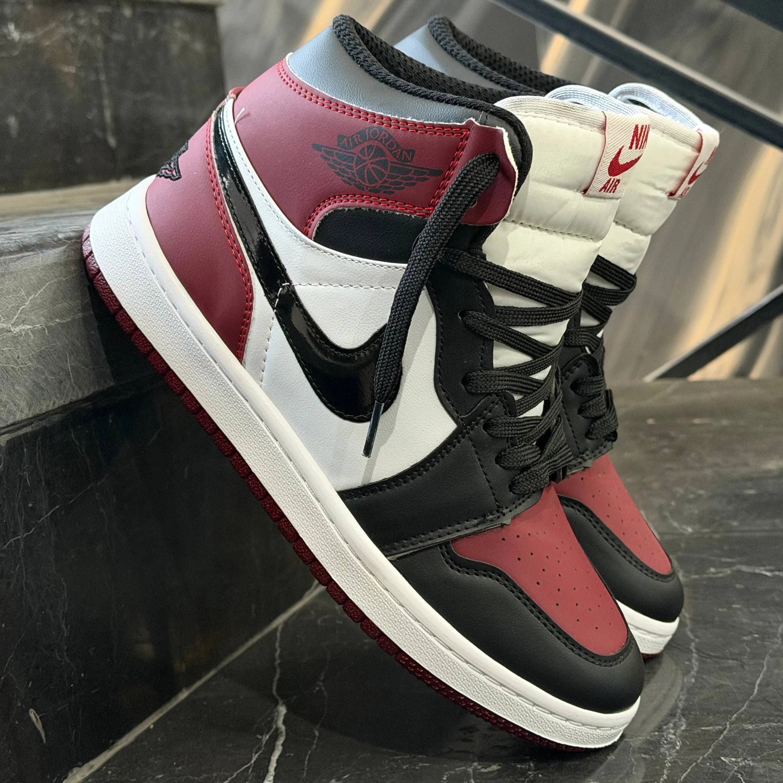 کفش کتانی زنانه نایک جردن 1 ساقدار مشکی چری Nike Jordan 1