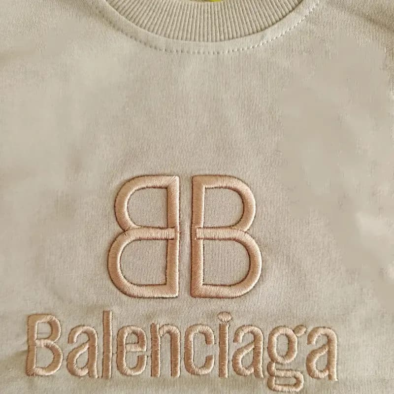 بلوز شلوار دورس بچگانه Balenciaga گلدوزی شده رنگ سبز بنتون نسکافه ای مشکی سایز 40 45 50 — تصویر ۵