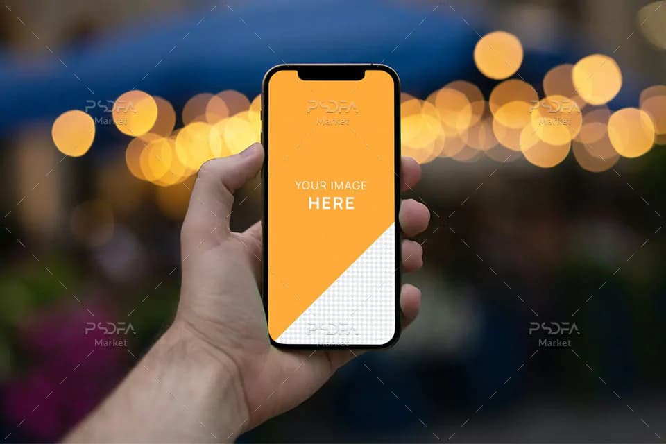 موکاپ آیفون 12 پرو در دست با بک گراند بوکه iPhone 12 Pro Mockup — تصویر ۲