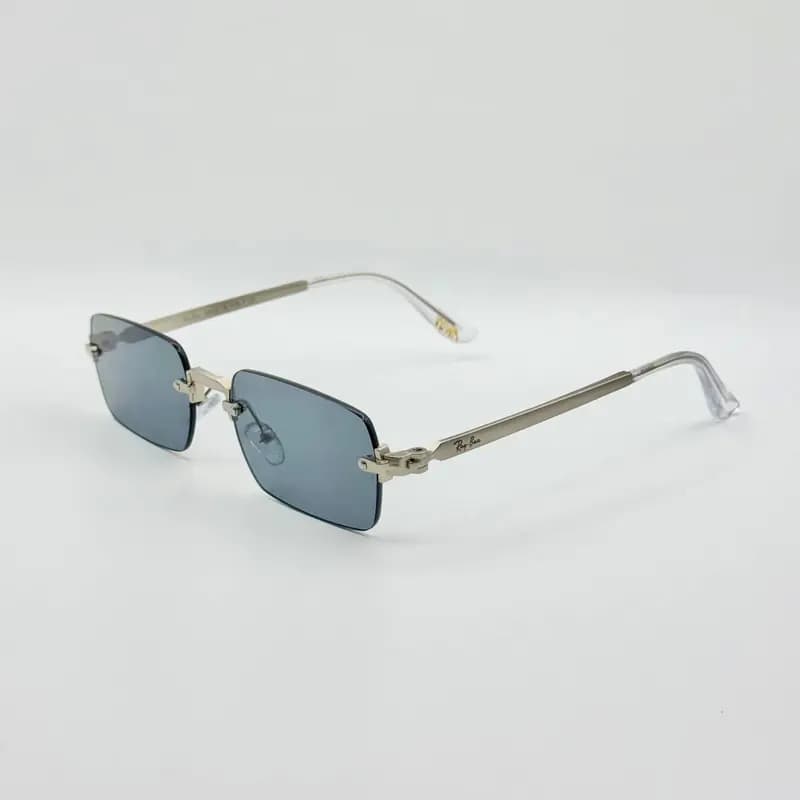 عینک آفتابی و بلوکات ریبن Ray-Ban مدل a2098 فریم لس مستطیل راکی AWGE — تصویر ۳