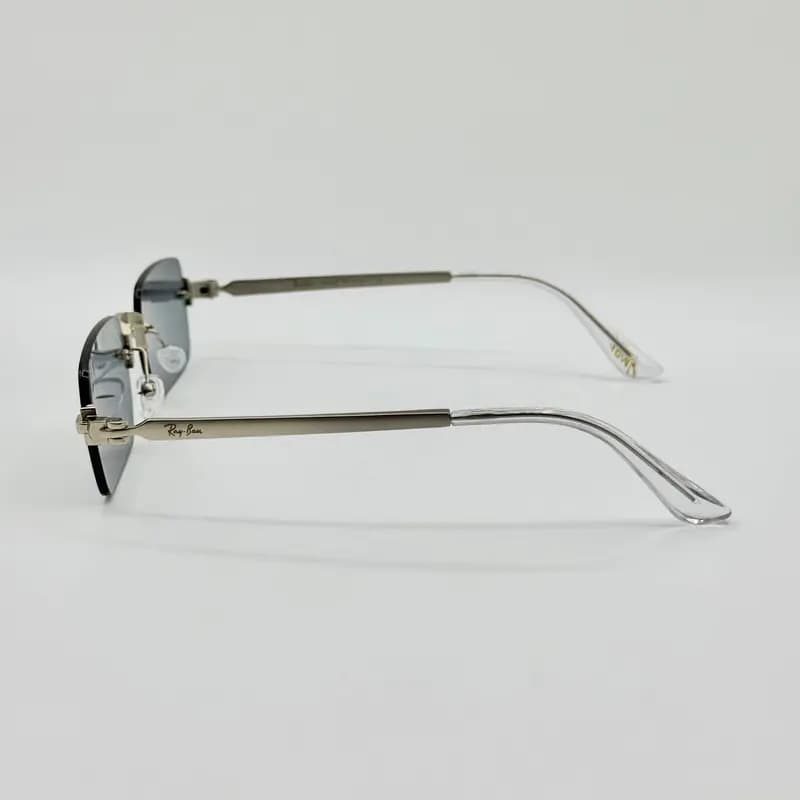 عینک آفتابی و بلوکات ریبن Ray-Ban مدل a2098 فریم لس مستطیل راکی AWGE — تصویر ۸
