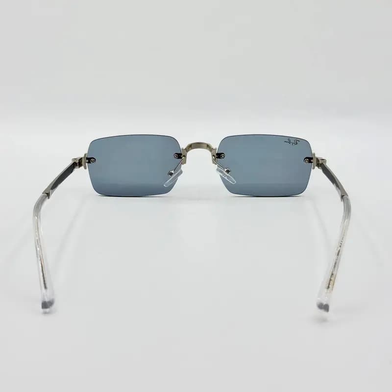 عینک آفتابی و بلوکات ریبن Ray-Ban مدل a2098 فریم لس مستطیل راکی AWGE — تصویر ۷