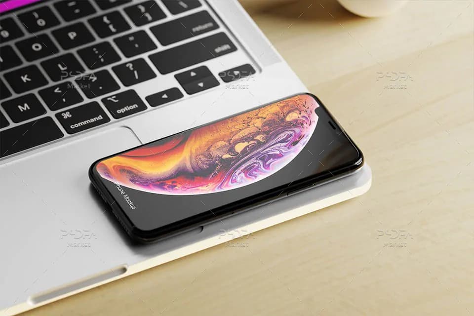 موکاپ گوشی آیفون 11 پرو روی مک بوک iPhone 11 Pro Mockup — تصویر ۴