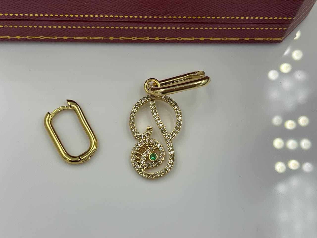 گوشواره طرح چشم با نگین سبز