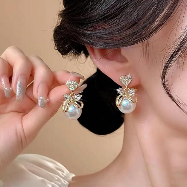 گوشواره مروارید پاپیونی با قلب نگینی جذاب