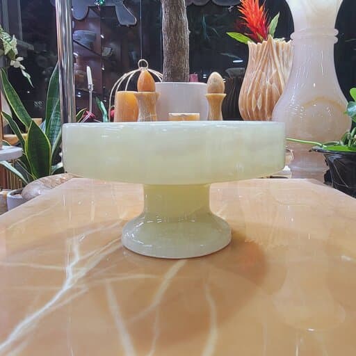 ظرف سنگی سرو و پذیرایی سنگ طبیعی ،مدل پایه دار ،یک تکه ،دارای جا برای وارمر و قوری برای گرم نگه داشتن دمنوش،کاربردی و شیک | هدیه تولد | جهیزیه عروس | کادویی | ظروف سنگی آقای سنگی | ظروف آنتیک و کلکسیو — تصویر ۲