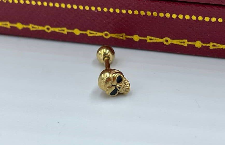پیرسینگ طرح جمجمه طلایی