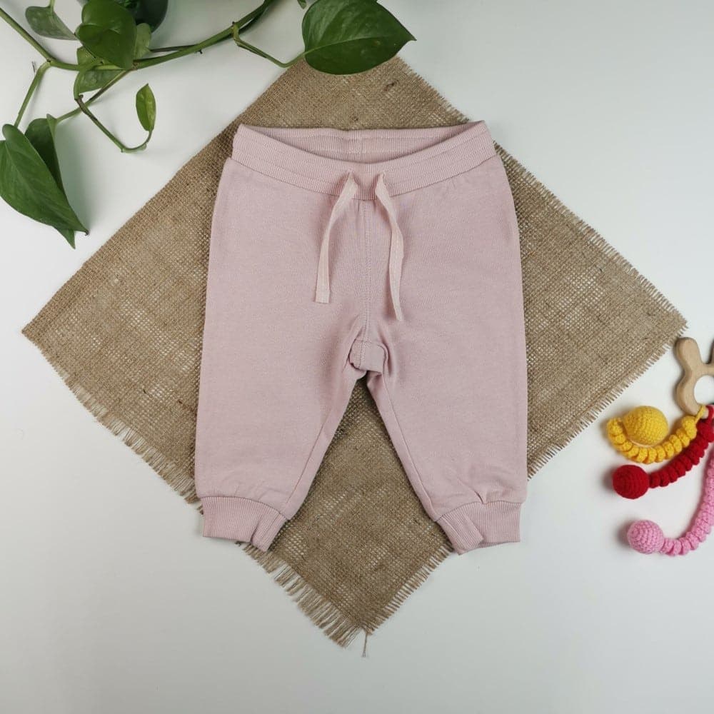 شلوار دورس دخترانه اسلش برند h&m توکرکی گلبهی روشن رنگ – 4-6 ماه