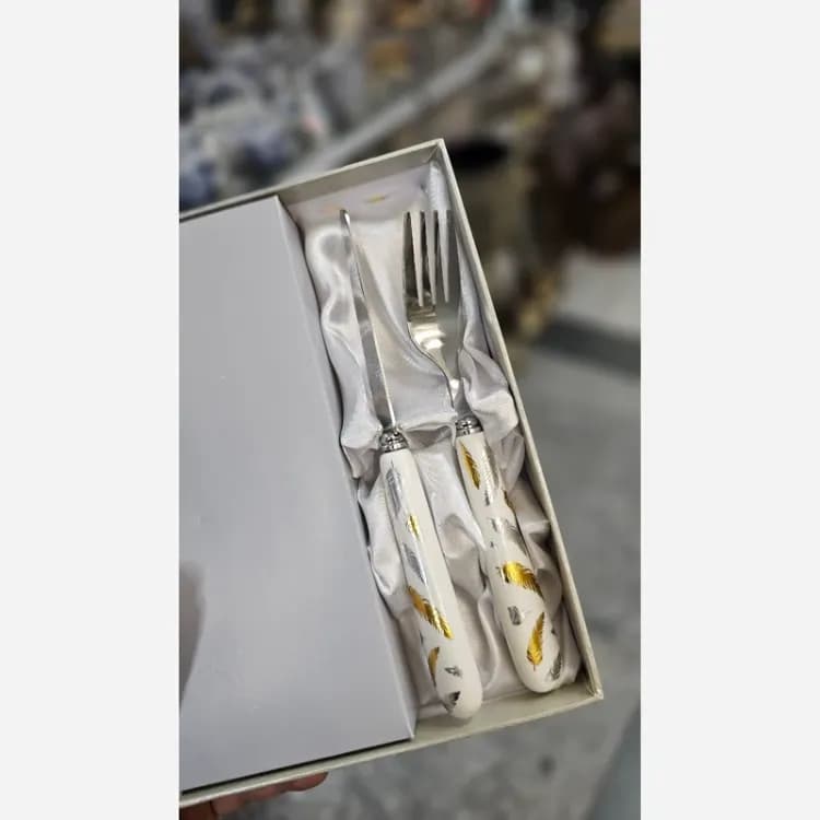 ست کارد و چنگال سرامیکی یونیک 12 عددی طرح پر — تصویر ۲