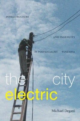 دانلود کتاب The City Electric: Infrastructure and Ingenuity in Postsocialist Tanzania
