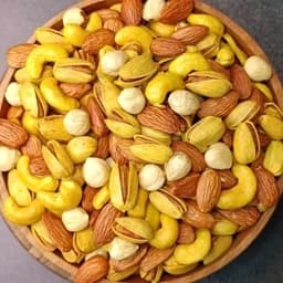 آجیل چهار مغز شور با کیفیت عالی (پسته اکبری)نیم کیلویی آجیل و خشکبار مهران — تصویر ۳