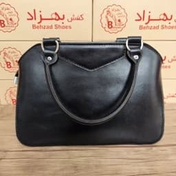 کیف دستی تمام چرم طبیعی گاوی درجه یک زنانه دخترانه رنگ مشکی دوخت ماشینی تک خانه کیفیت عالی — تصویر ۳