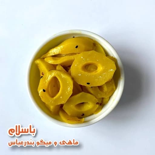 ترشی انبه سبز درجه 1 طعم ملس ظرف 1 کیلویی — تصویر ۲
