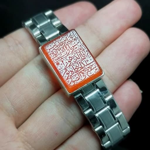 دستبند نقره بند رولکسی 925 عیار دست ساز نگین عقیق خراسانی پرتقالی حکاکی شده مزین به دعای حرز امام جواد ع (صغیر) — تصویر ۲