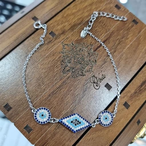 دستبند نقره زنانه چشم نظر لوزی آبکاری طلا سفید عیار 925 — تصویر ۲