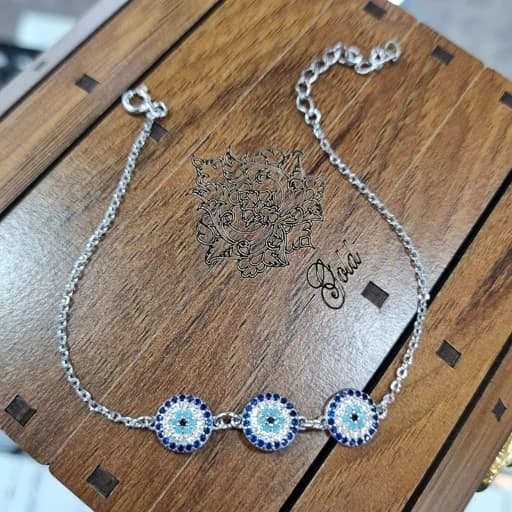 دستبند نقره زنانه چشم نظر سه تایی عیار 925 با آبکاری طلا سفید — تصویر ۲