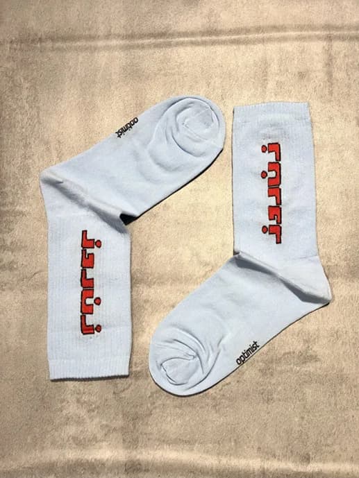 جوراب ساقدار کش انگلیسی اسپرت برند Optimist طرح تکست زن روز — تصویر ۴