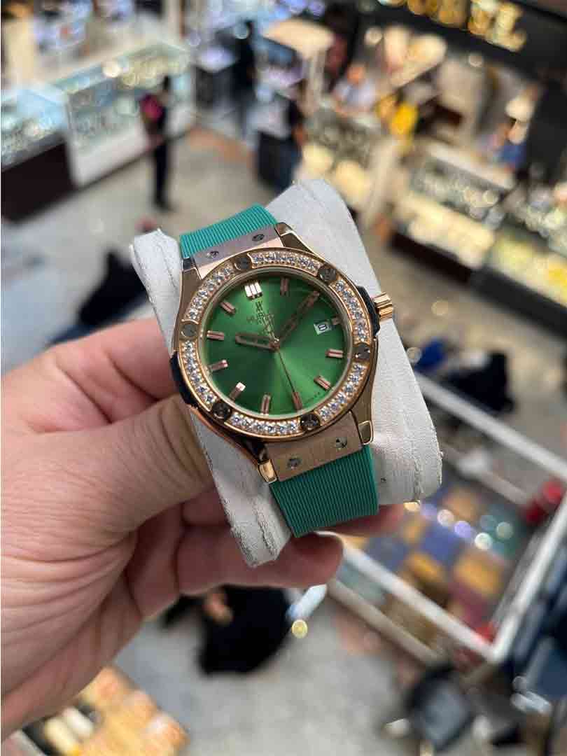 ساعت مچی زنانه هابلوت دورنگین بند سبز قاب رزگلد صفحه سبزمدل Hublot Diamonds