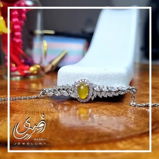 دستبند نقره زنانه شرف الشمس طرح مروارید — تصویر ۷