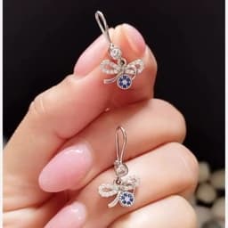 گوشواره نقره زنانه طرح پاپیون و چشم نظر عیار 925 مدل قفل قلابی — تصویر ۳