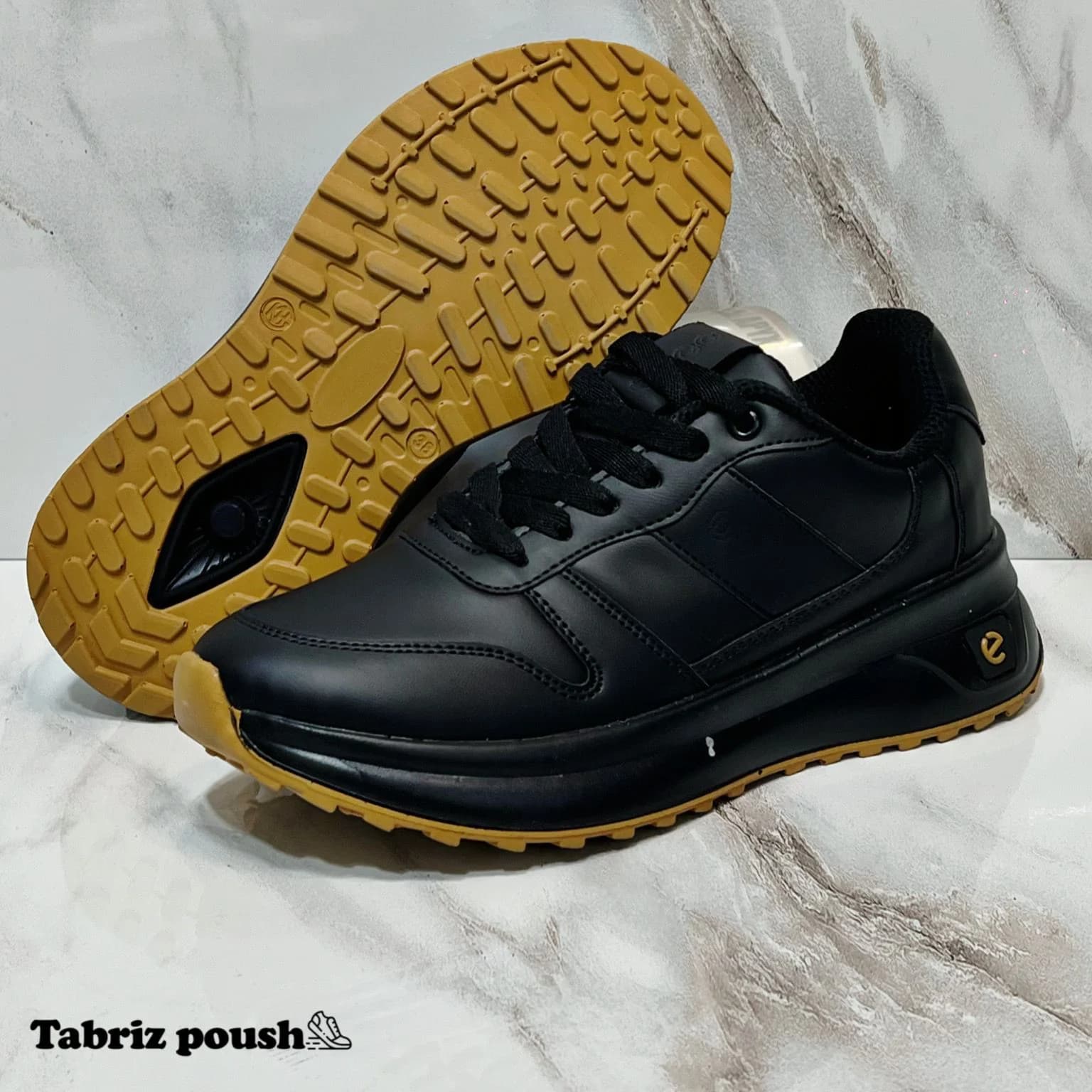 کفش طبی زنانه و پسرانه اکو زیره ژله ای رویه طرح چرم مشکی تبریز پوش — تصویر ۳