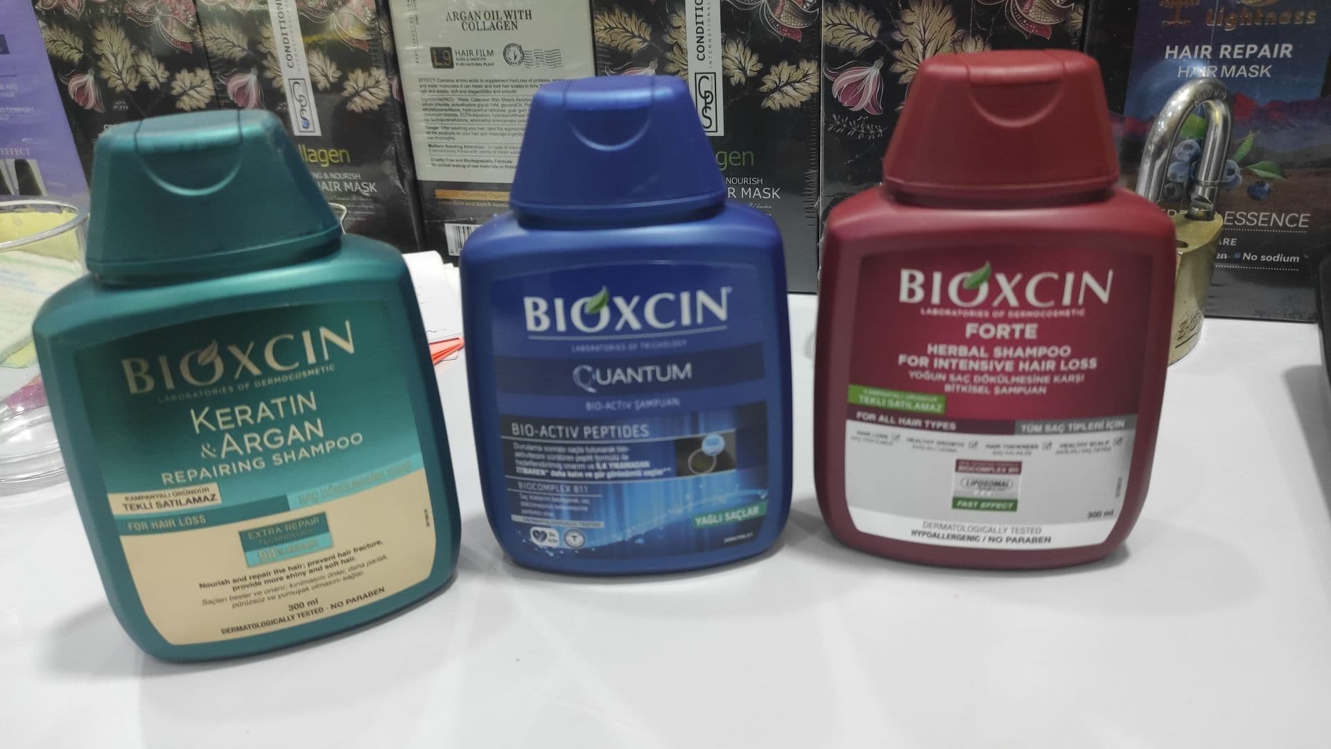 شامپو بیوکسین ضد ریزش مو و ترمیم کننده مو Bioxcin حاوی آرگان و کراتین هیدرولیز شده 300 میل اورجینال — تصویر ۵