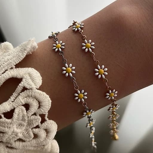 دستبند بابونه طلایی و نقره ای — تصویر ۳