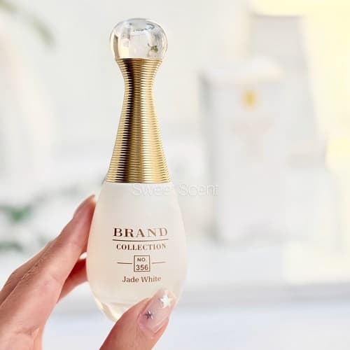 عطر ادکلن مینی دیور جادور پارفوم د او (دیور جادور سفید) برند کالکشن | Dior J’adore Parfum d’Eau (Brand Collection) حجم 25 میل کد 356(شرکتی) — تصویر ۲