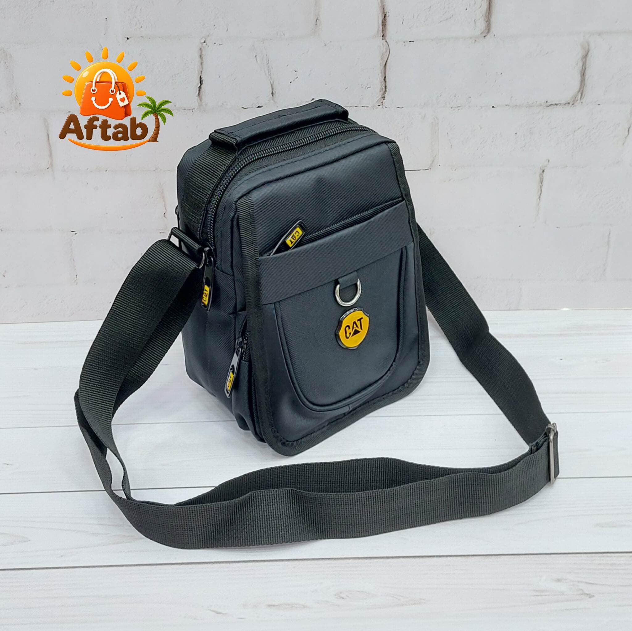 کیف دوشی برزنتی مردانه حلقه جلو Cat کوچک — تصویر ۸