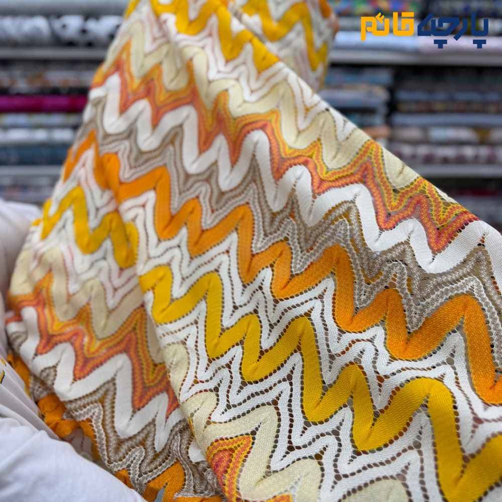 پارچه بهاره و تابستانه میسونی طرح درشت نارنجی انبه ای عرض ۱۵۰ کد:۱۳۱۱۲