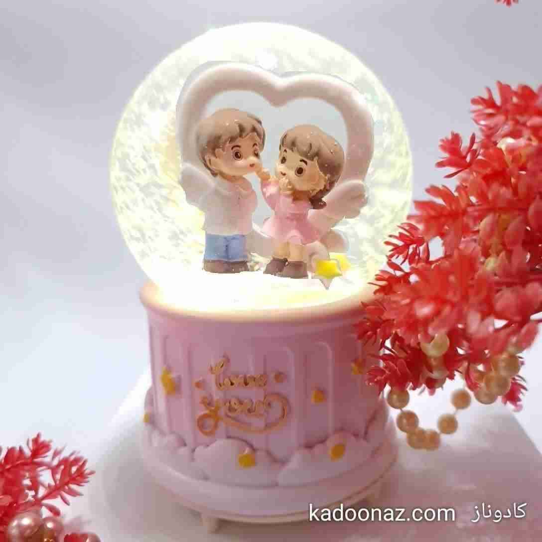 گوی شیشه ای بزرگ چرخان موزیکال عشق بیپایان — تصویر ۵