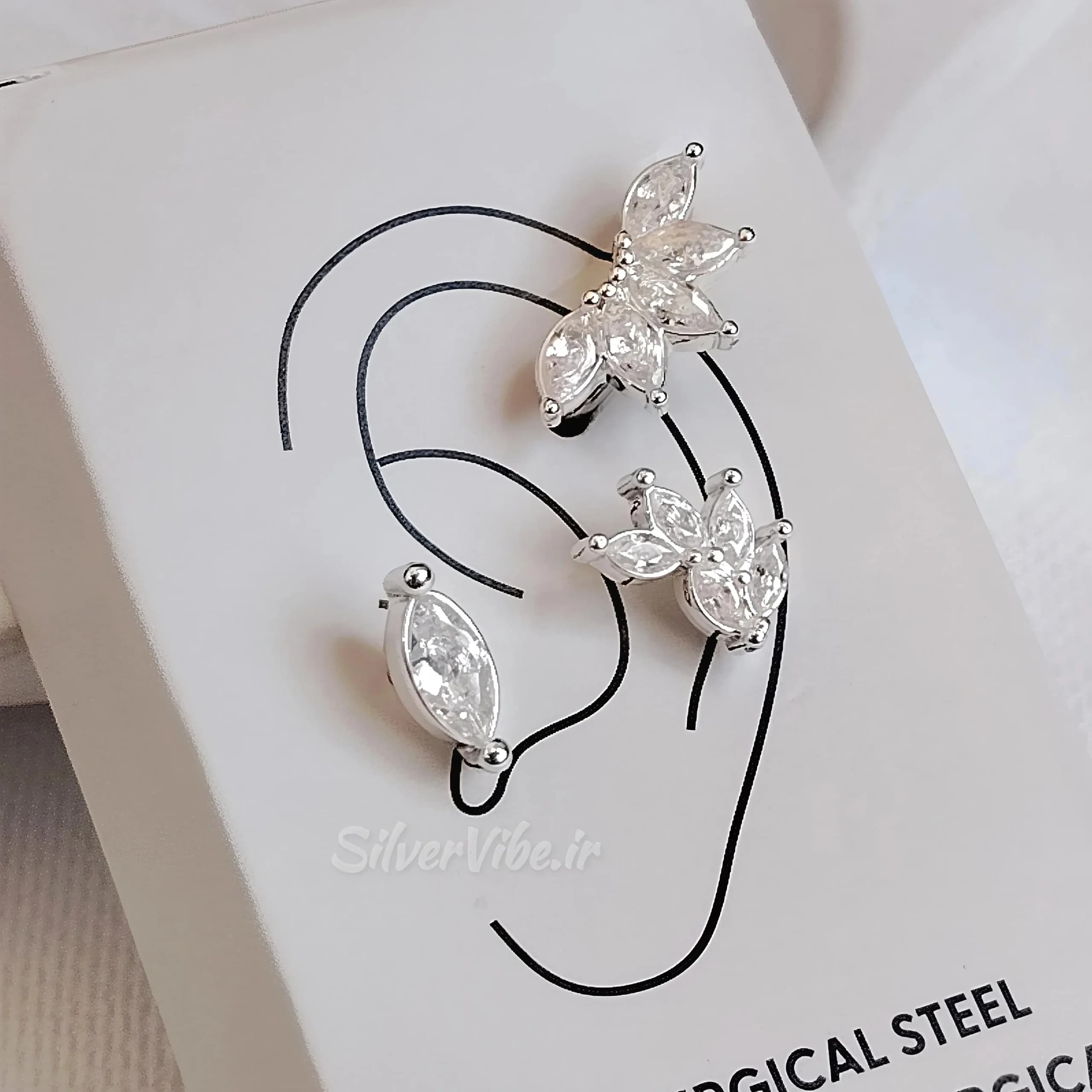 ست سه عددی پیرسینگ گوش حلقه ای و میخی طرح تاج نیلوفر و نگین مارکیز با پایه استیل ضد حساسیت — تصویر ۶