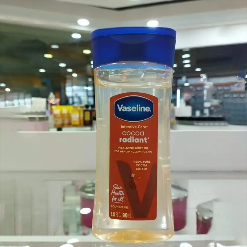 ژل روغن بدن وازلین کاکائو رادیانت Cocoa Radiant (روغن ماساژ وازلین) Vaseline اصل — تصویر ۴