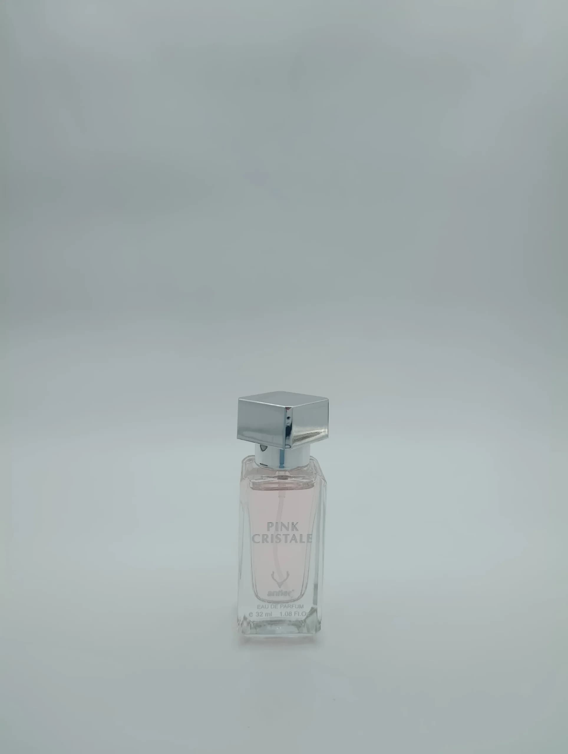 ادو پرفیوم جیبی زنانه انتلر Antler مدل پینک کریستال Pink Cristale حجم ۳۲ میل | خنک و شیرین گلی میوهای ورساچه برایت کریستال — تصویر ۳