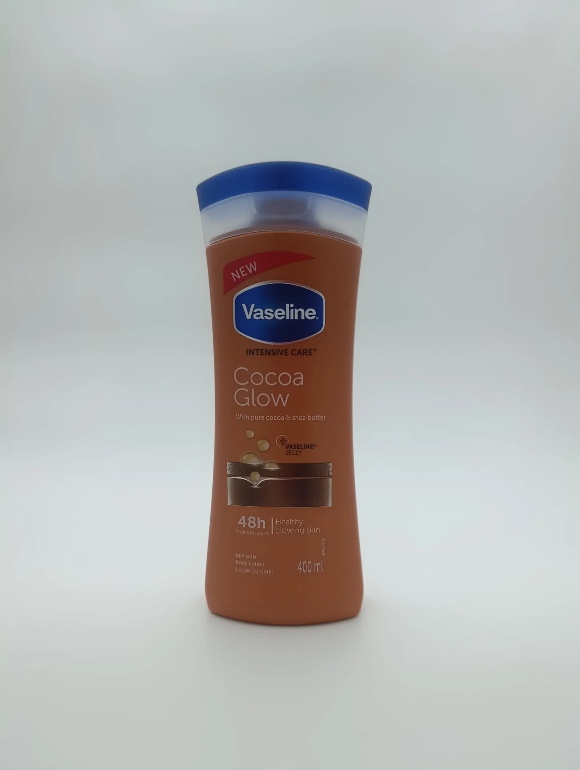 لوسیون بدن کره کاکائو و شی باتر وازلین Vaseline مدل Cocoa Glow حجم ۴۰۰ میل | درخشانکننده و نرمکننده ۴۸ ساعته (اصل)