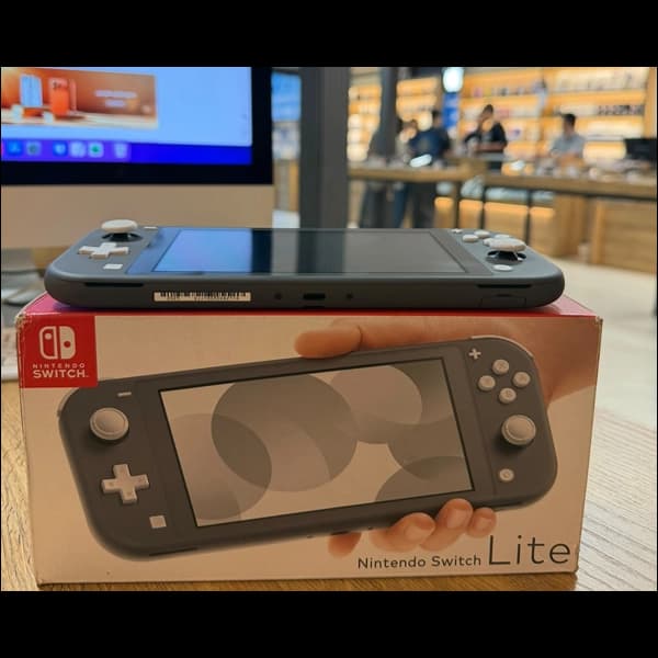 کنسول بازی نینتندو مدل Switch Lite کپی خور شده همراه با کارت حافظه 256 گیگابایت فول بازی (آنباکس) — تصویر ۳