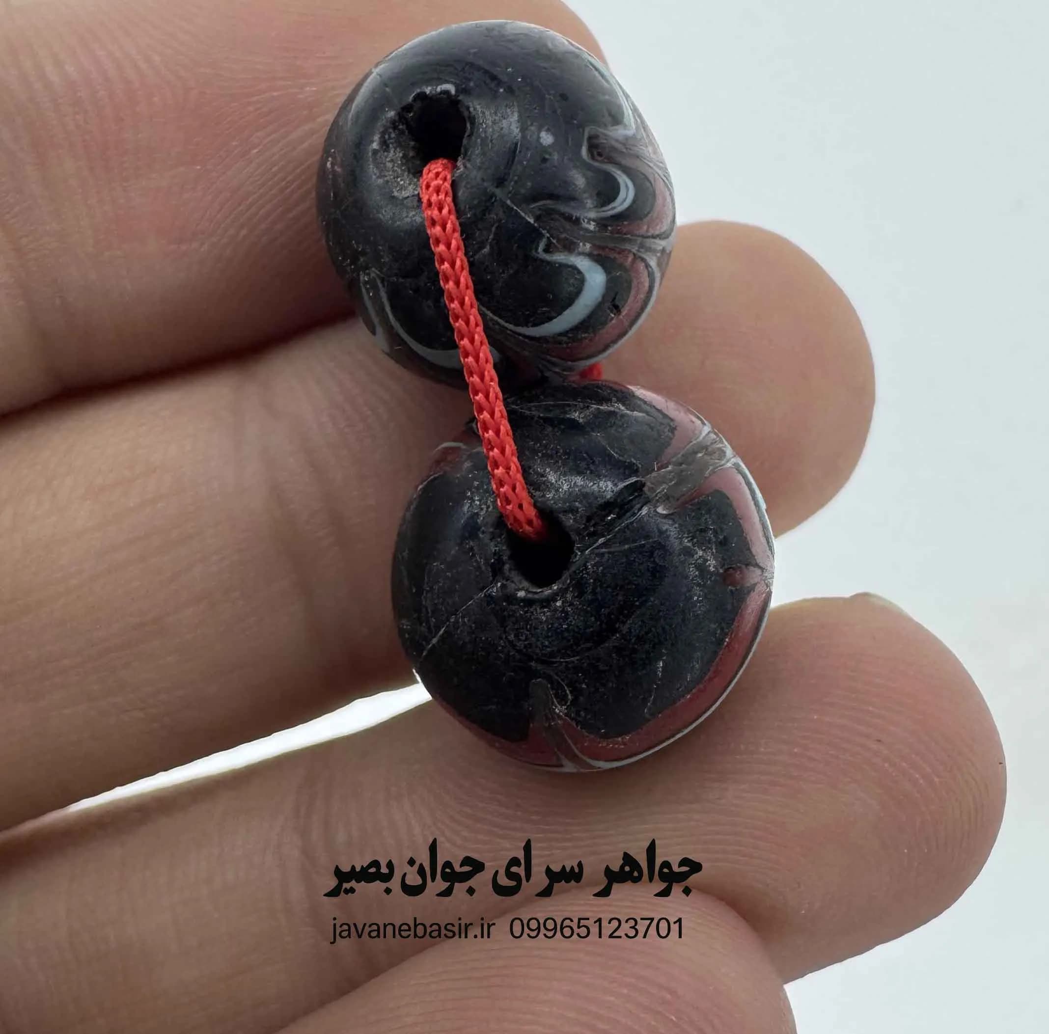جفت مهره چیتو (مینا) با نقشهای چرخشی؛ نماد جریان انرژی و پویایی — تصویر ۲