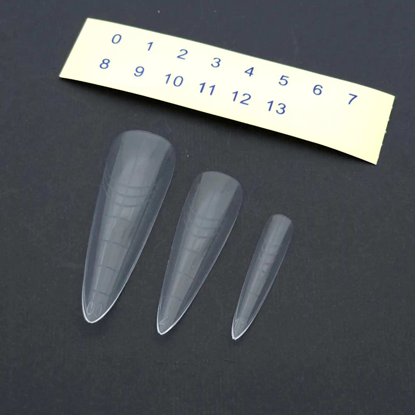 قالب کاشت ناخن مستر ژل Master Gel طرح استیلتو بلند(Stiletto L) بسته ۱۴۰ عددی | تیپ دوال فرم شفاف پلی ژل و ژلیکس سایزبندی ۰ تا ۱۳ — تصویر ۲