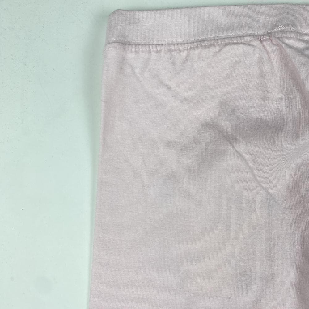 شلوار دخترانه ساده طرح عروسک زرد کمرکش صورتی کمرنگ – 8 تا 10 سال — تصویر ۵