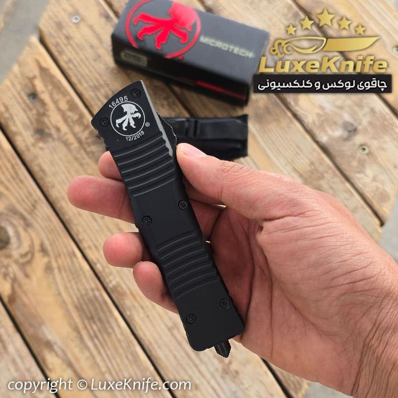 چاقوی میکروتک ضامن اتومات مدل m-35 ( همراه کیف برزنتی و جعبه ) — تصویر ۳