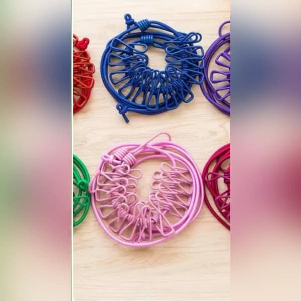 بند رخت گیرهدار کشی با 12 گیره فلزی