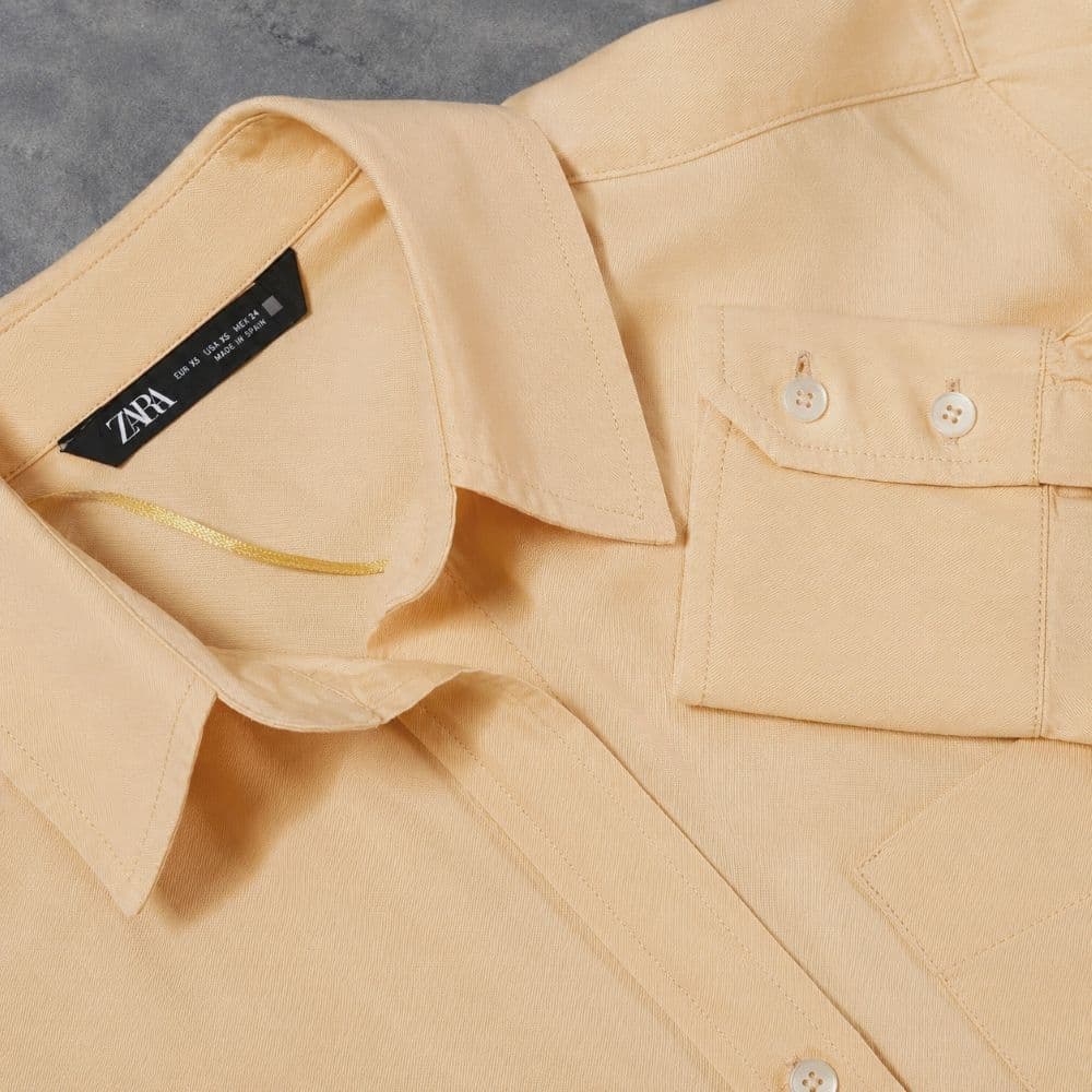 شومیز بیسیک هلویی وارداتی برند Zara Spain سایز 38 تا 42 کد 3231 — تصویر ۴