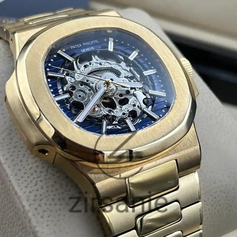 ساعت مچی مردانه پتک فیلیپ ناتیلوس اسکلتون اتومات طلایی صفحه آبی Patek Philippe Nautilus Skeleton Automatic Golden Blue Screen — تصویر ۴
