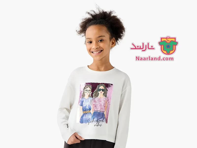 تیشرت کراپ آستین بلند نخی برند Juniors سفید طرح پولک برگردان انیمه