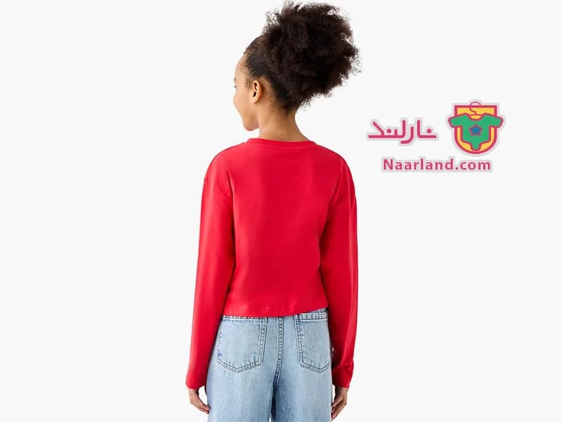 تیشرت کراپ آستین بلند نخی برند Juniors قرمز پولک برگردان new york 36 — تصویر ۴