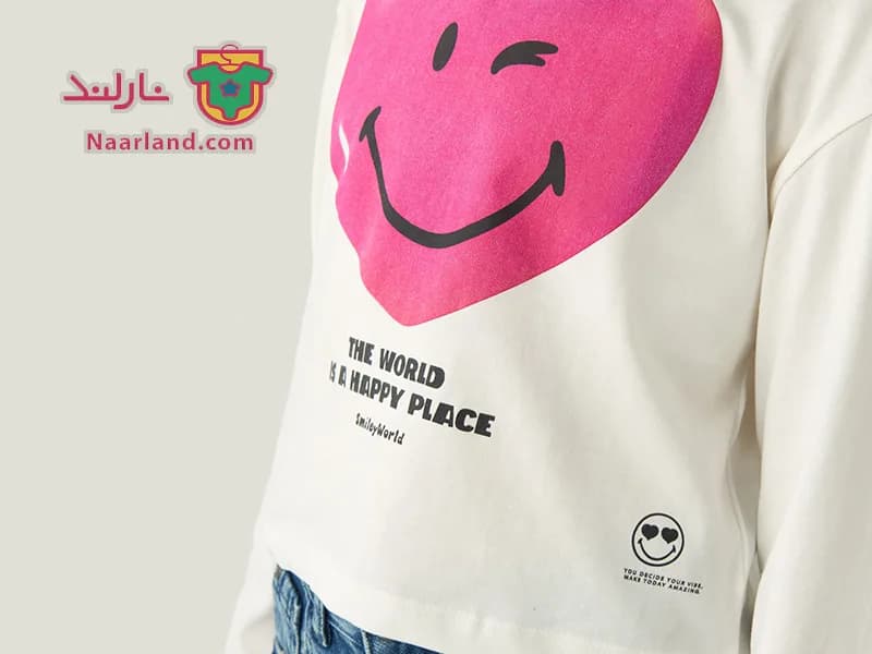 تیشرت کراپ آستین بلند نخی Smiley World سفید طرح قلب — تصویر ۲