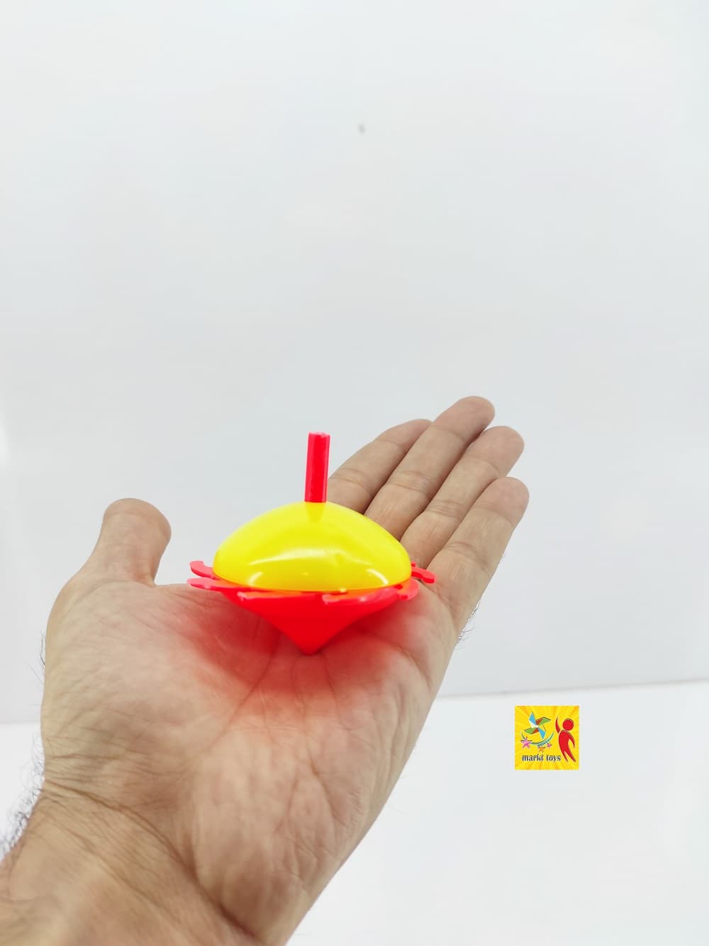 پک عمده اسباب بازی فرفره پلاستیکی چین دار 40عددی — تصویر ۶