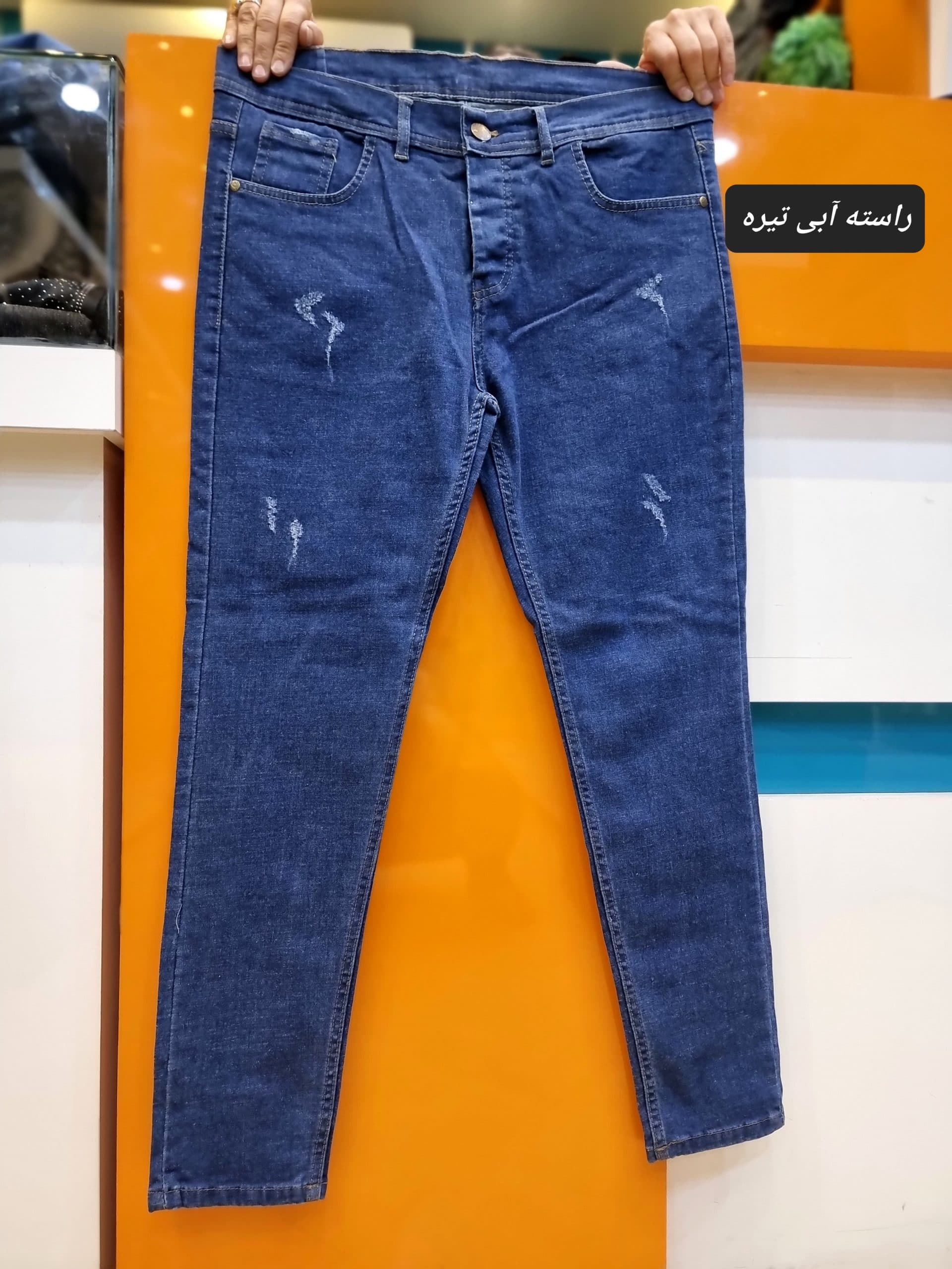 شلوار جذب نیم راسته جین مردانه آبی — تصویر ۳