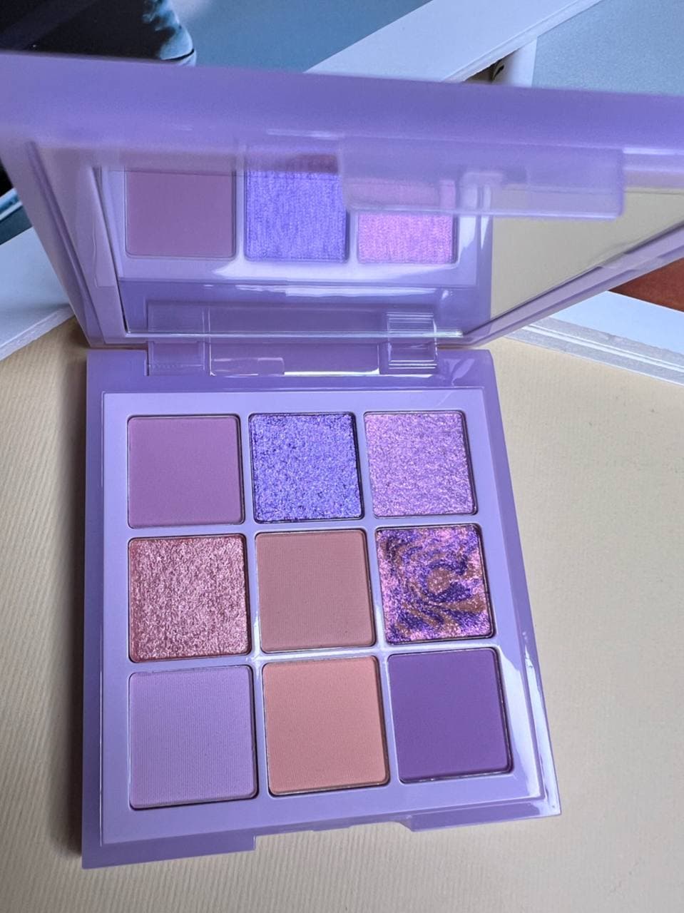 پالت سایه 9 رنگ پاستل لیلاک هدی بیوتی HUDA BEAUTY PASTELS LILAC EYESHADOW PALETTE — تصویر ۱۲