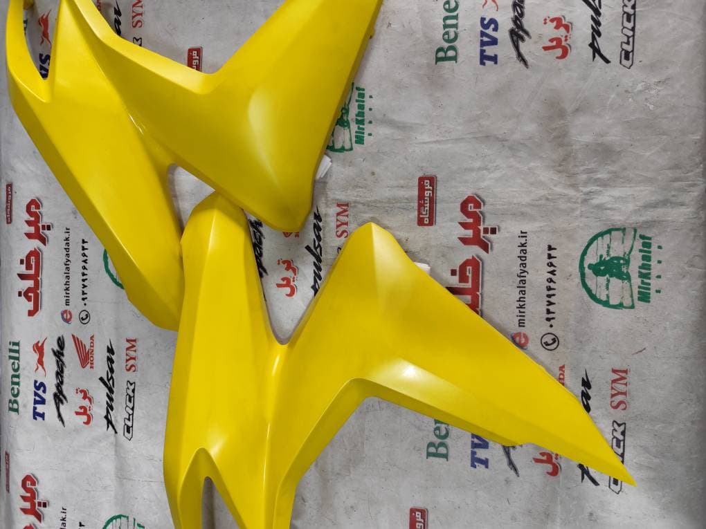 قاب (کاور فلاپ) بغل بلوری چراغ جلو موتور طرح کلیک (زرد مات) خارجی (سمت چپ)